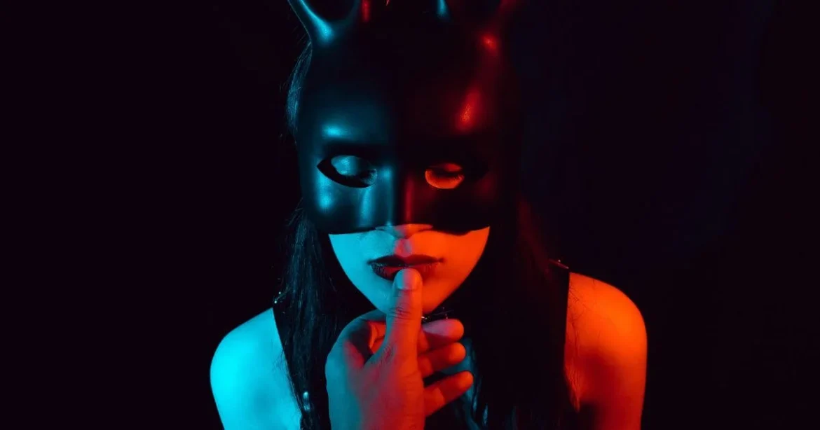 Insightful Quotes about Submission in BDSM A sensual submissive woman with her Dominant's finger to her lip as he reads her quotes about submission.