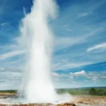 A jet of water squirting out of a geyser, representing is squirt pee.