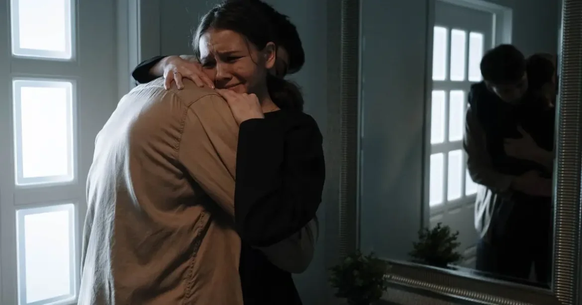 How to Navigate Triggers in BDSM: A Supportive Guide for Tops and Bottoms A woman struggling with navigating triggers in BDSM. She is emotional and upset.