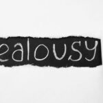 jealousy in BDSM. Written on a notebook.
