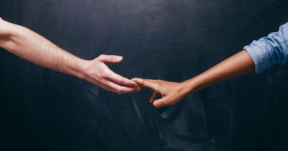 Attachment styles in BDSM holding hands.