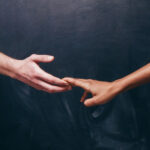 Attachment styles in BDSM holding hands.