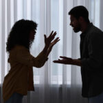 A couple arguing about the submissive topping from the bottom.