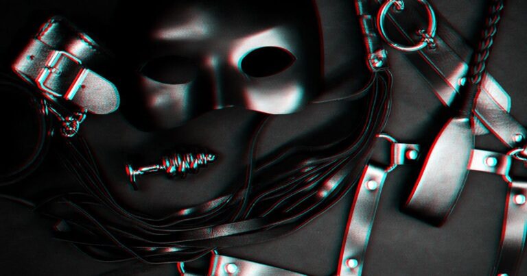 BDSM for beginners on a background with toys.