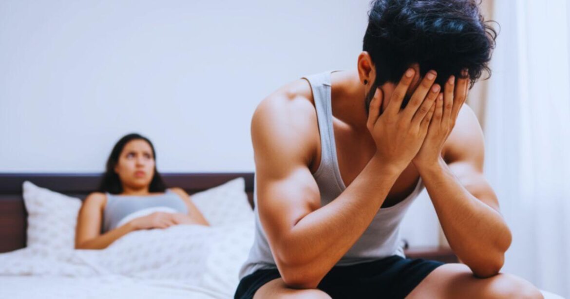 A couple in bed arguing because one person is kinkier than the other